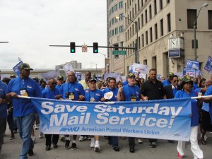 Rev. Jesse Jackson marching with postal workers in Detroit, August 2010
