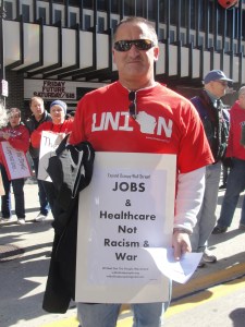 Worker marches against Chase & M & I banks in Milwaukee Oct. 15.