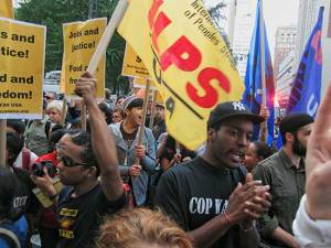 Wall Street occupiers march on NYPD headquarters. 