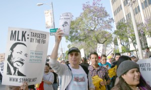 Carlos Montes, center, marching in Los Angeles. 