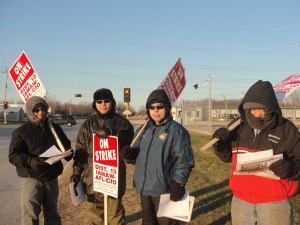 Machinists union members on the picket line at Manitowoc Co. Dec. 6, 2011.