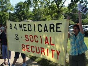 At a protest against the Americans For Prosperity (Austerity) in Topeka, Kansas July 10, 2013.