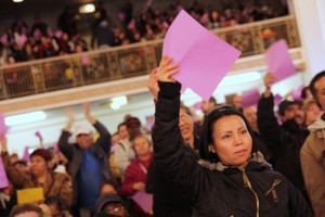 Woman-with-crowd-behind-300x200