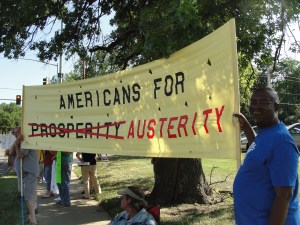 Protest at the right-wing Wall Street funded Americans For Prosperity office in Topeka, KS July 10, 2013.