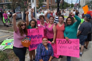 Protesters at the National Governor's Association in Milwaukee August 3, 2013.