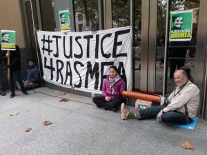 Activists lock themselves to the doors of a federal building in Oakland, CA November 12, 2014 to demand the immediate freedom of Rasmea Odeh. 