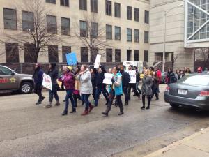 Marquette students stepping it up and taking to the street and shutting down traffic in front of the jail and court house [Photo: Josh Del Colle].