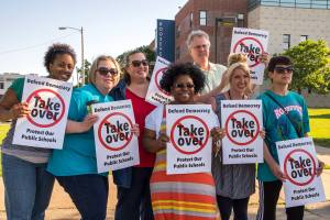 Several of the Roosevelt School of the Arts staff took this photo in front of their building before walking in together June 10. Solidarity! [Photo: Joe Brusky]