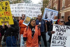 Pam Africa marching in Philly demanding justice for Mumia Abu-Jamal and all prisoners [Photo: Joe Piette]